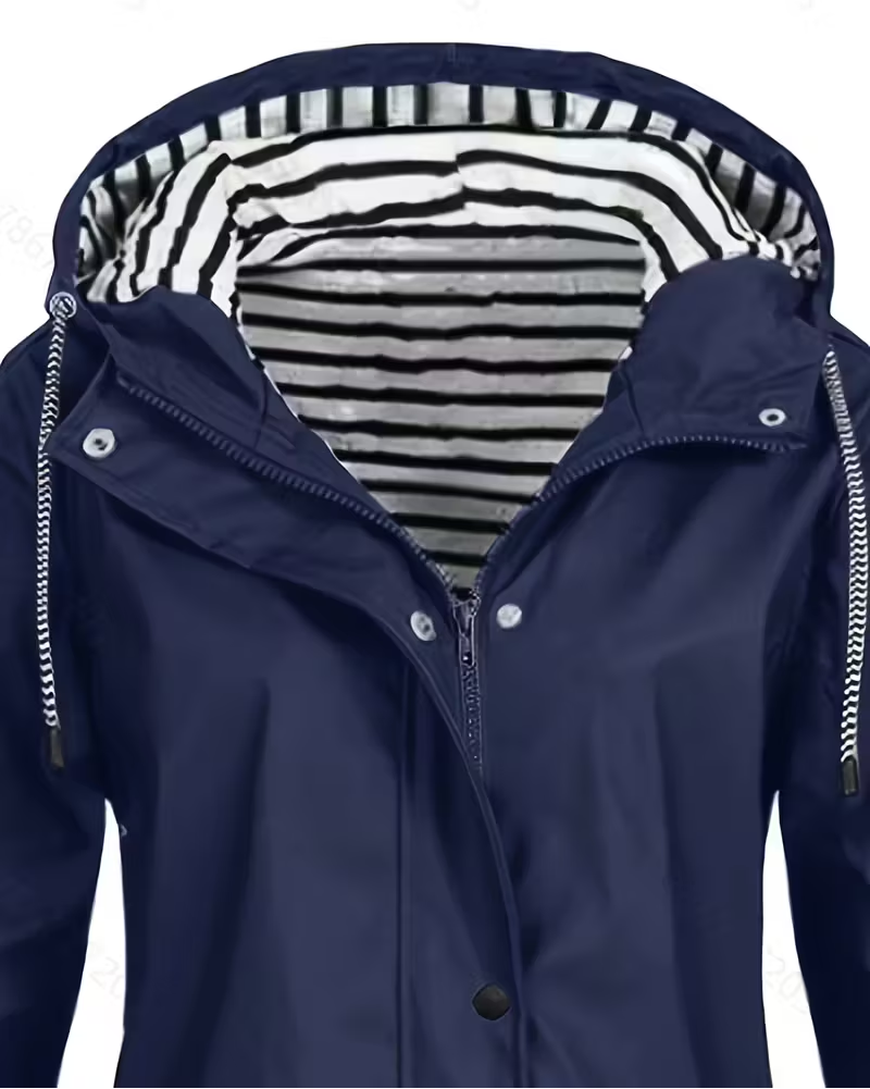 TOÑI™ | CHAQUETA CORTAVIENTOS CON CAPUCHA