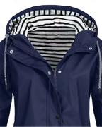 TOÑI™ | CHAQUETA CORTAVIENTOS CON CAPUCHA