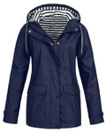 TOÑI™ | CHAQUETA CORTAVIENTOS CON CAPUCHA